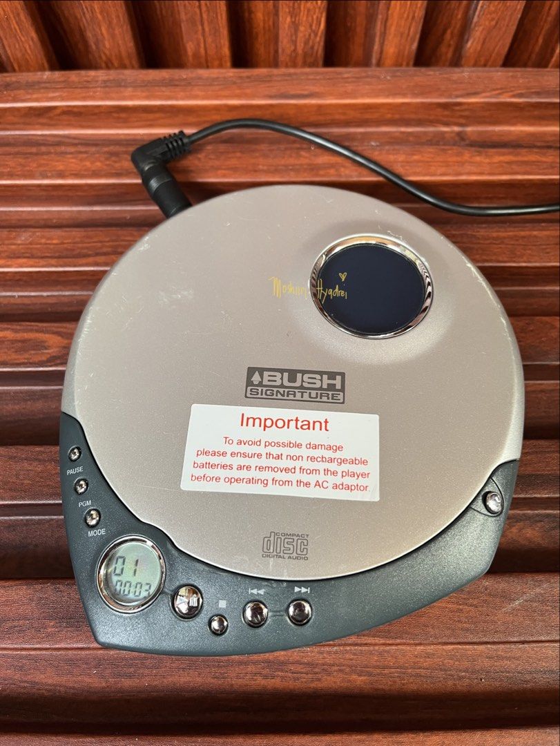 Bush Signature Personal CD Player (Category: Portable Music Players) located in Valenzuela. Submitted by moshiiri_kawaii_v2 (Listing ID 1423667322, Image 2). Description: Bush Portable CD Player Working with 5v Bush power plug Flaws: battery power supply not working due to corroded part check last pic, minimal scratches selling as is .