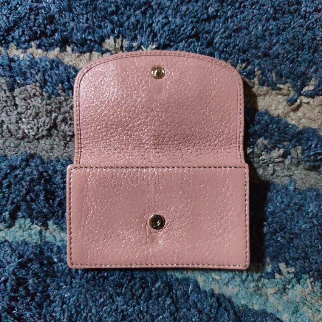 Chloe Key card Holder (Category: Luxury Bags & Wallets) located in Caloocan City. Submitted by fast_transact (Listing ID 1423689791, Image 2). Description: - Authentic Chloe key holder - Pink leather - Bow detail on front - Snap closure - Interior with card slots and small compartment - Chloe logo inside.