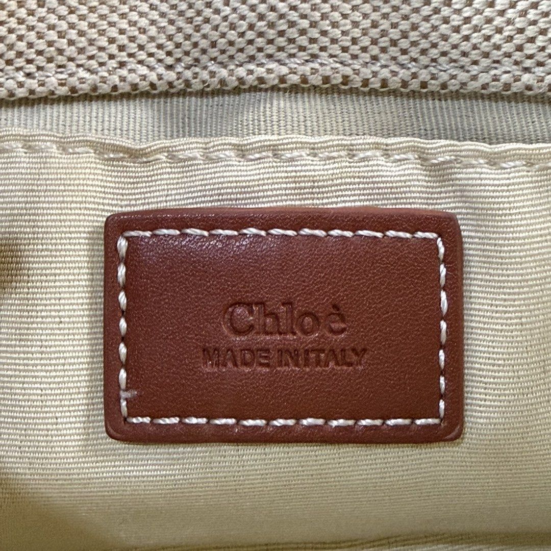 Chloe Woody Mini with Strap (Category: Luxury Bags & Wallets) located in Kabacan. Submitted by rags2penny.phl (Listing ID 1423630683, Image 2). Description: - Chloe Woody crossbody bag - Canvas body with leather trim - Detachable shoulder strap - Chloe logo on front - Made in Italy - Serial number: 02 21 75 65 Measurements : 8 x 6 issue : minor scratch & peel off (see 4th & 5th photo).