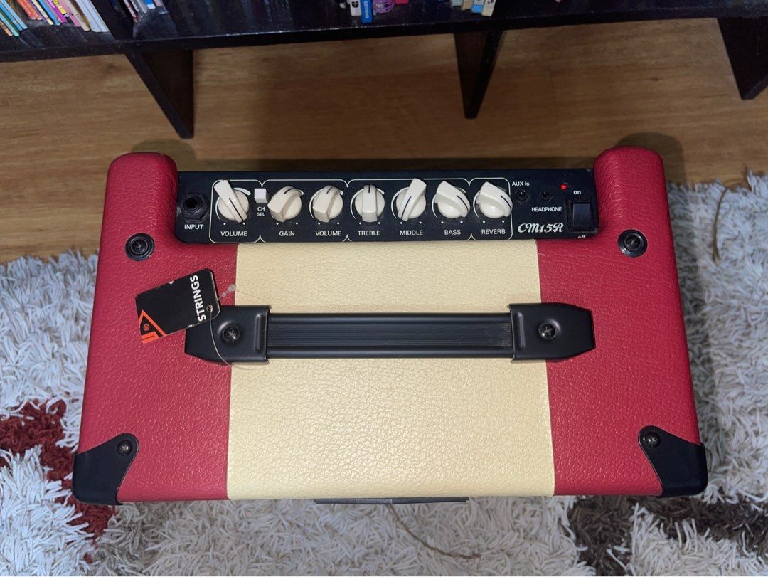 Cort CM15R Electric Guitar Amplifier (Category: Soundbars, Speakers & Amplifiers) located in Los Banos. Submitted by yeikie (Listing ID 1423705823, Image 2). Description: Cort CM15R Electric Guitar Amplifier with Reverb 15-watt RMS solid-state combo guitar amplifier featuring a custom 8-inch speaker, 3-band EQ (Bass, Middle, Treble), onboard digital reverb, and a switchable overdrive channel Perfect condition, used only once for testing. Rfs: Dec