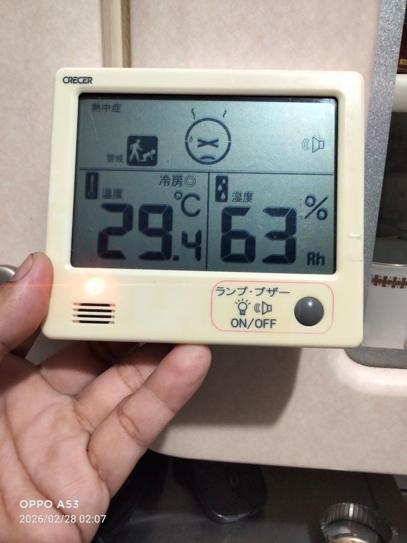 Crecer Digital Thermometer (Category: Health Monitors & Weighing Scales) located in Carmona. Submitted by rpute (Listing ID 1423775196, Image 2). Description: Crecer digital thermometer displays temperature in Celsius and relative humidity. It features an on/off button for the lamp/buzzer function. The screen shows a temperature of 29.5°C and a humidity level of 64%..