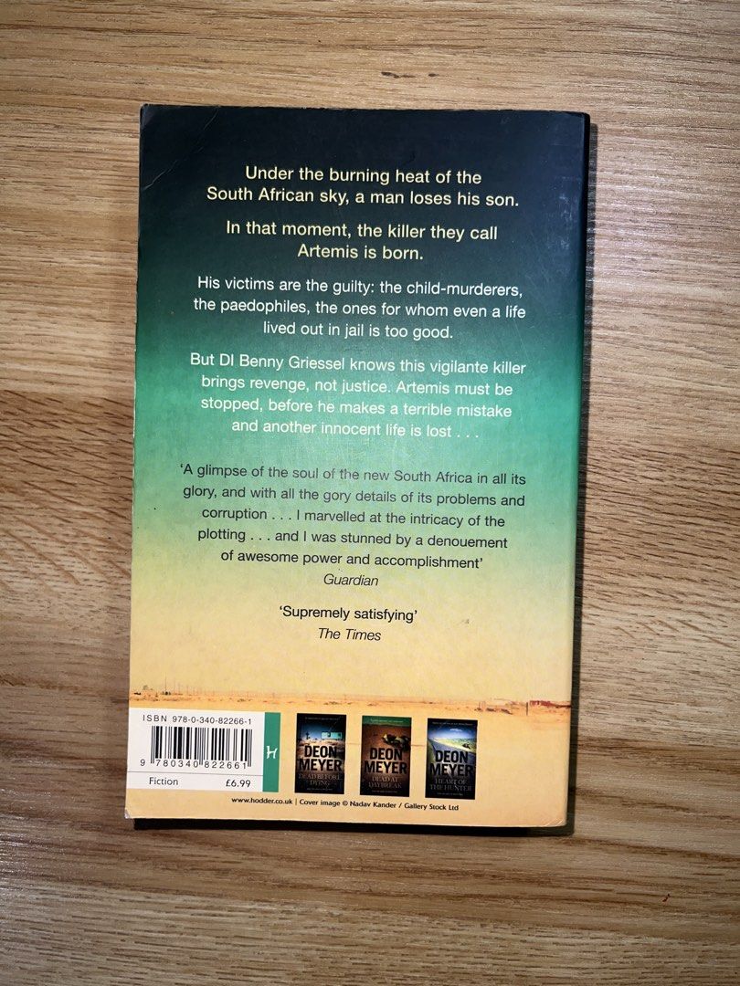Devil's Peak by Deon Meyer (Category: Storybooks) located in Makati City. Submitted by m9rtha (Listing ID 1423639599, Image 2). Description: - Devil's Peak by Deon Meyer - Published by Hodder - Cover: Desert landscape with car and tree - Includes back cover synopsis and quotes - Price: £6.99.