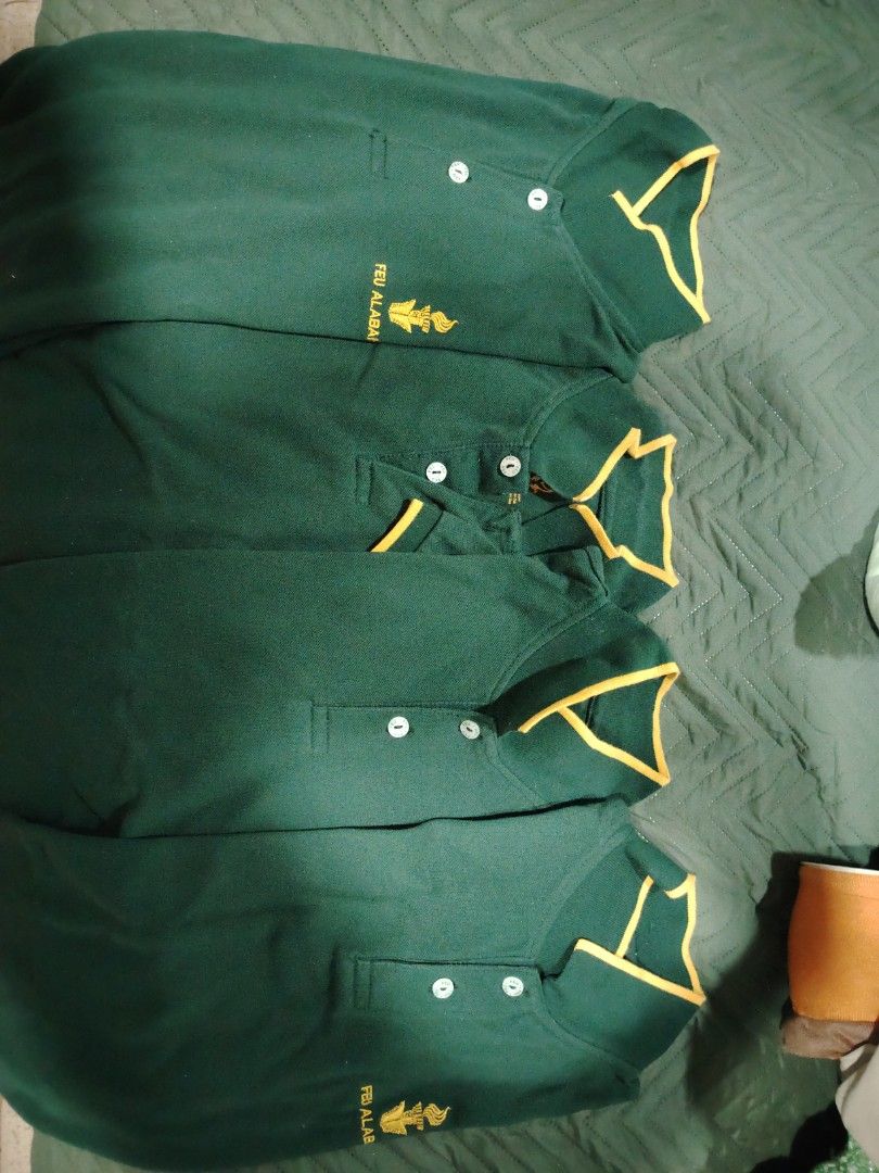 FEU Alabang Polo Shirt (Category: Tshirts & Polo Shirts ) located in Imus. Submitted by angelworks (Listing ID 1423727584, Image 1). Description: - Green polo shirt - Yellow accents on collar and sleeves - Features FEU Alabang logo - Collared neckline with 3-button 4 pcs large size - Comfortable fabric - very good condition -RFS transferred to diff school .