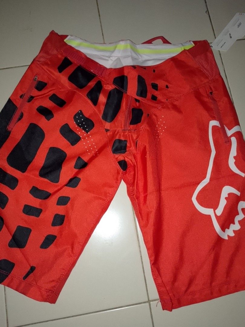 Fox Racing MTB Shorts (Category: Shorts) located in Quezon City. Submitted by jonathan_ilog18 (Listing ID 1423646092, Image 1). Description: - Fox Racing MTB shorts - Available in red (size 36) and blue (size 34) - Features Fox logo - Black patterned accents - Made in Vietnam.