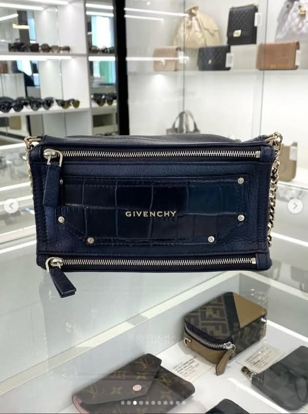 Givenchy Pandora Box Shoulder Bag (Category: Luxury Bags & Wallets) located in Quezon City. Submitted by barbosac (Listing ID 1423764969, Image 2). Description: - Givenchy Pandora Box shoulder bag - Navy blue color - Chain strap - Crocodile-embossed leather panel - Rectangular shape - Multiple zippers - Givenchy logo - Spacious interior.