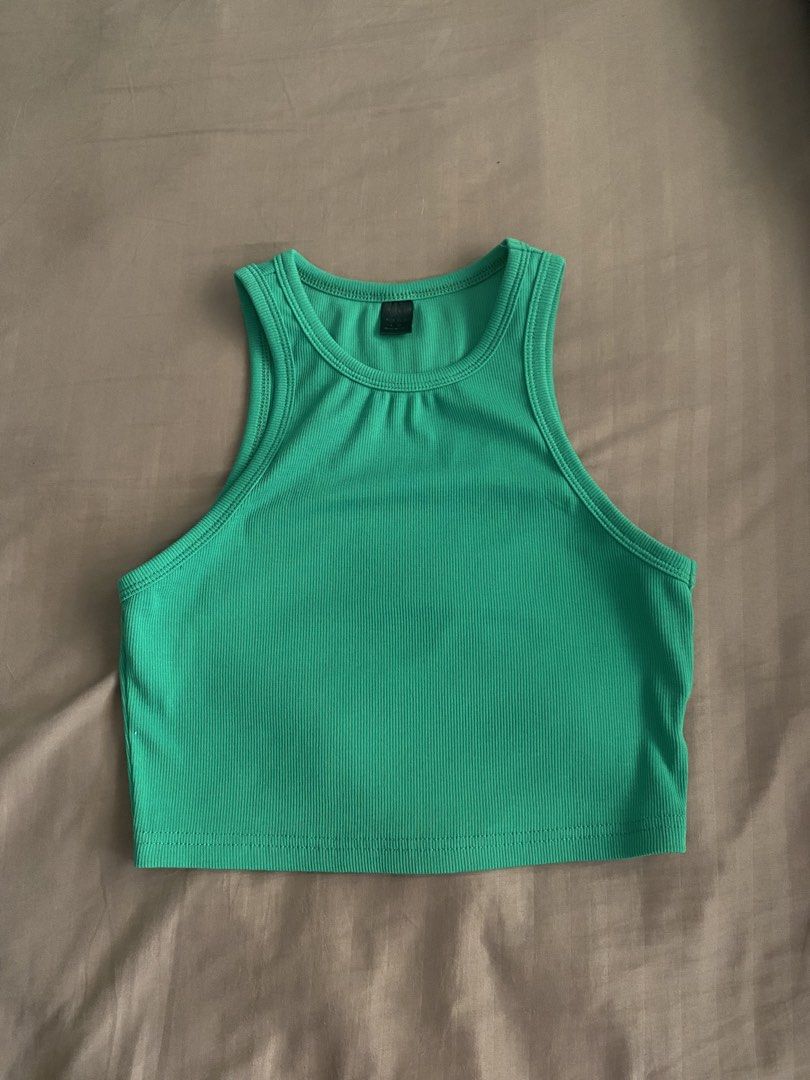 green racerback croptop (Category: Sleeveless) located in Bocaue. Submitted by cleodeclutters (Listing ID 1423721547, Image 1). Description: ☆ color may vary due to lighting ☆ mop : gcash, maya, bdo mod : j&t, lalamove message for more details & inquiries ➔ payment first ➔ strictly no return & refund.