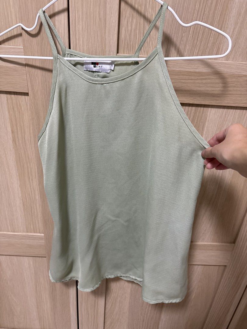 Green top (Category: Sleeveless) located in Singapore. Submitted by tammyj (Listing ID 1423746607, Image 1). Description: .