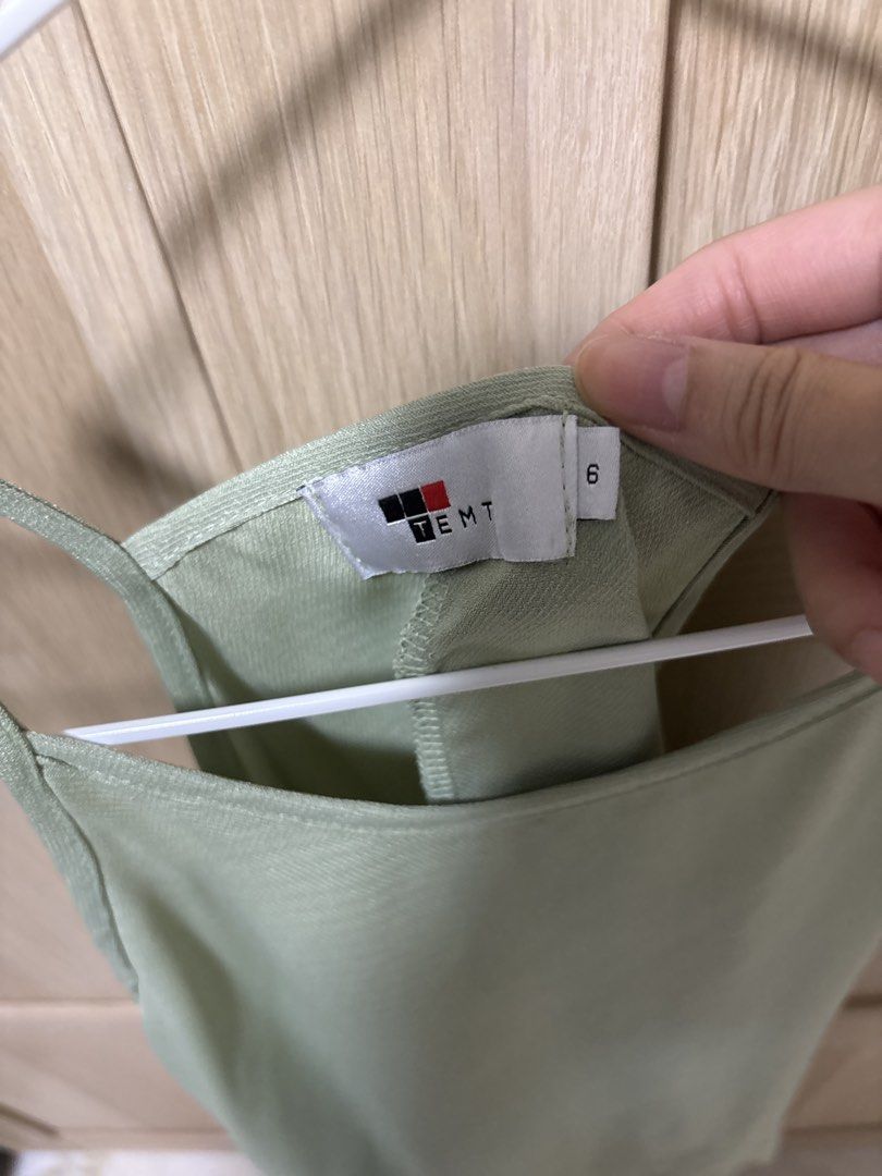 Green top (Category: Sleeveless) located in Singapore. Submitted by tammyj (Listing ID 1423746607, Image 2). Description: .