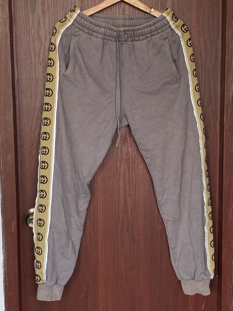 SALE!!! Gucci Reflectorized Side Tape Joggers (Category: Luxury Apparel) located in Bacolod City. Submitted by PSGTHRIFTIES (Listing ID 1423635896, Image 1). Description: Very good condition Size S on tag fits M-L Dimensions: Waist:27 up to 39 Length:38 DM📩.