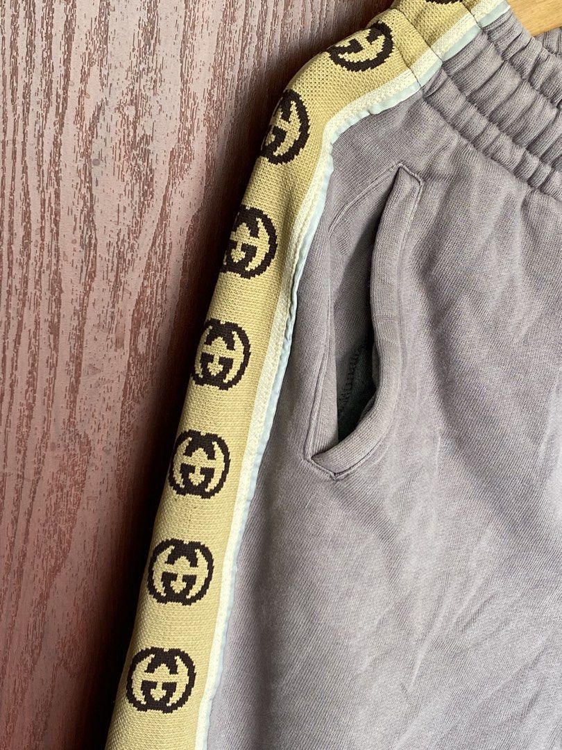SALE!!! Gucci Reflectorized Side Tape Joggers (Category: Luxury Apparel) located in Bacolod City. Submitted by PSGTHRIFTIES (Listing ID 1423635896, Image 2). Description: Very good condition Size S on tag fits M-L Dimensions: Waist:27 up to 39 Length:38 DM📩.
