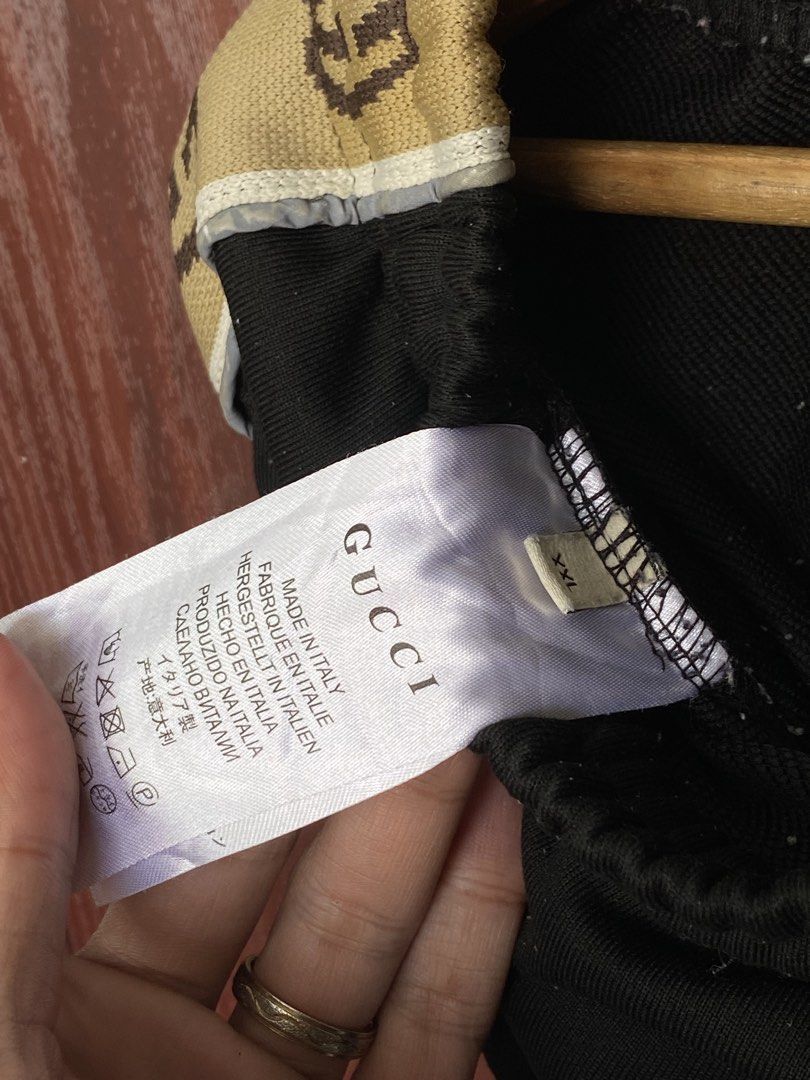 Gucci Reflectorized Side Tape Jogger Pants (Category: Luxury Apparel) located in Bacolod City. Submitted by PSGTHRIFTIES (Listing ID 1423706879, Image 3). Description: Very good to excellent condition Color rate: 9.8/10 black na black pa! *Minimal lints didn’t come from the fabric/pants itself. Size M Dimensions: Width:28 up to 38 Length:38 DM📩.