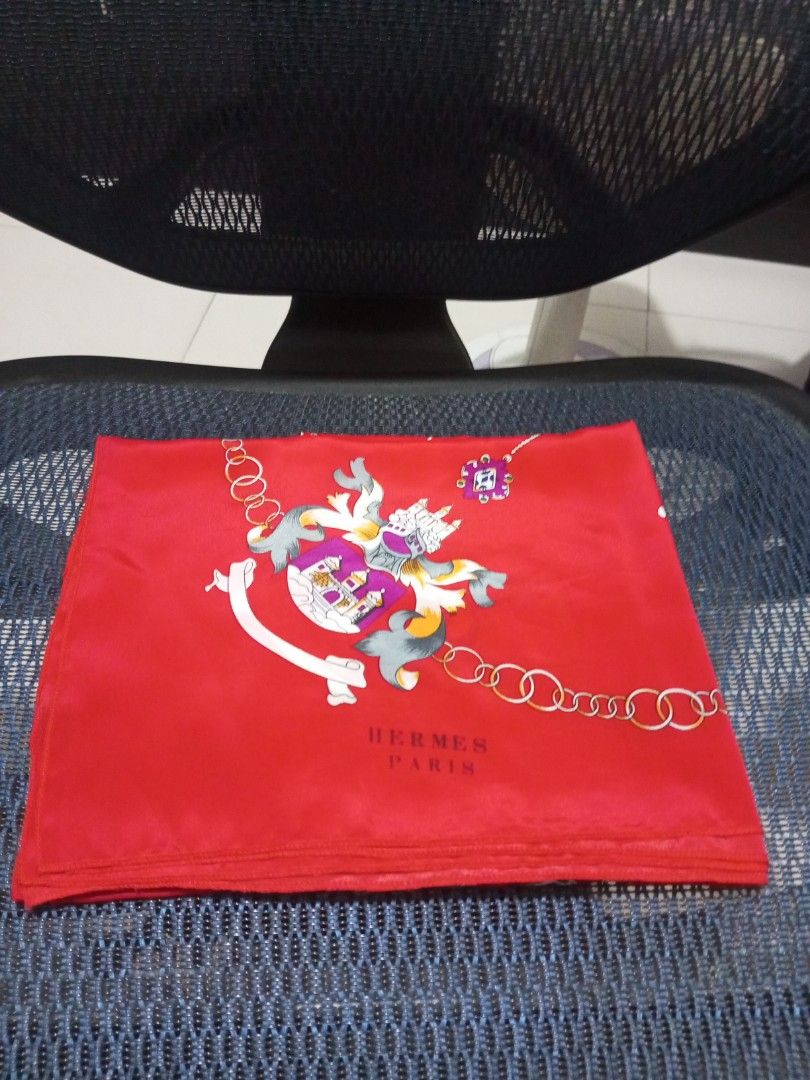 Hermes Paris Silk Scarf ( authenticity is not guaranteed) (Category: Scarves) located in Davao. Submitted by zoiesells_63 (Listing ID 1423681326, Image 1). Description: - Authentic Hermes Paris scarf - Color: Vibrant Red - Design: Chain and emblem print - Shape: Square - Material: Luxurious Silk - Brand: Hermes Paris.