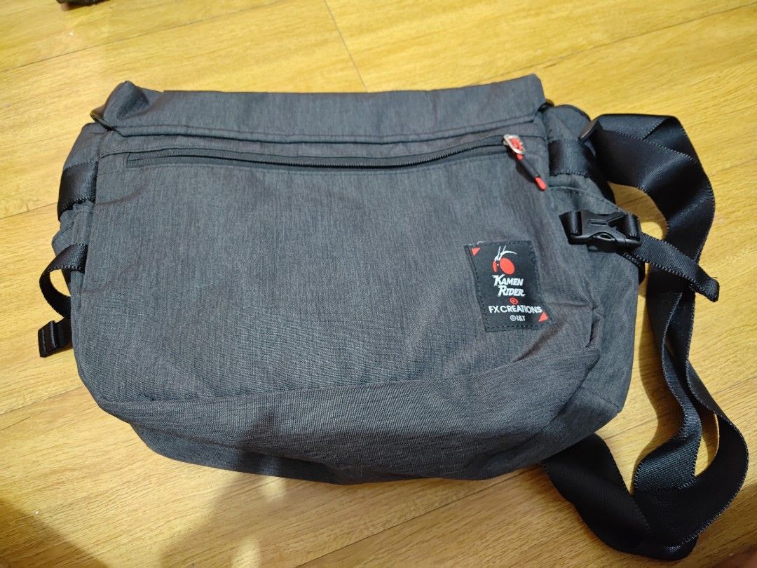 Kamen Rider FX Creatons Messenger Bag (Category: Luxury Bags & Wallets) located in Manila. Submitted by sixesandsevens (Listing ID 1423702730, Image 3). Description: Description The Kamen Rider Black x FX Creations collaboration spotlights the three iconic characters – Black, Black RX & Shadow Moon, which arrives in backpacks, crossbody bags, water bottles and cardcases. This messenger bag offers an aesthetic inspired by bold color and imagery, c