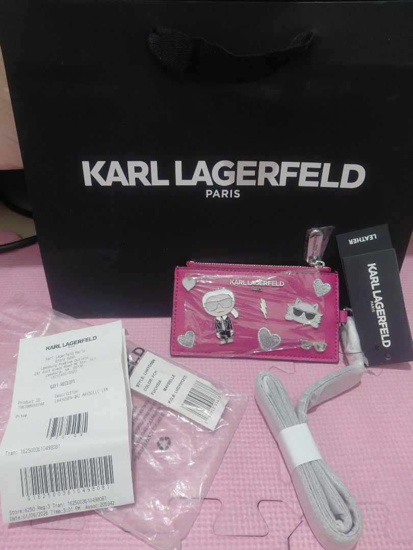 KARL LAGERFIELD CARD PURSE (Category: Luxury Bags & Wallets) located in Manila. Submitted by bashamylove0116 (Listing ID 1423771851, Image 1). Description: - Authentic Karl Lagerfeld Card Purse - Vibrant pink color - Includes original tags - Comes with a shoulder strap - Features a fun Karl Lagerfeld design - Perfect for cards and essentials.
