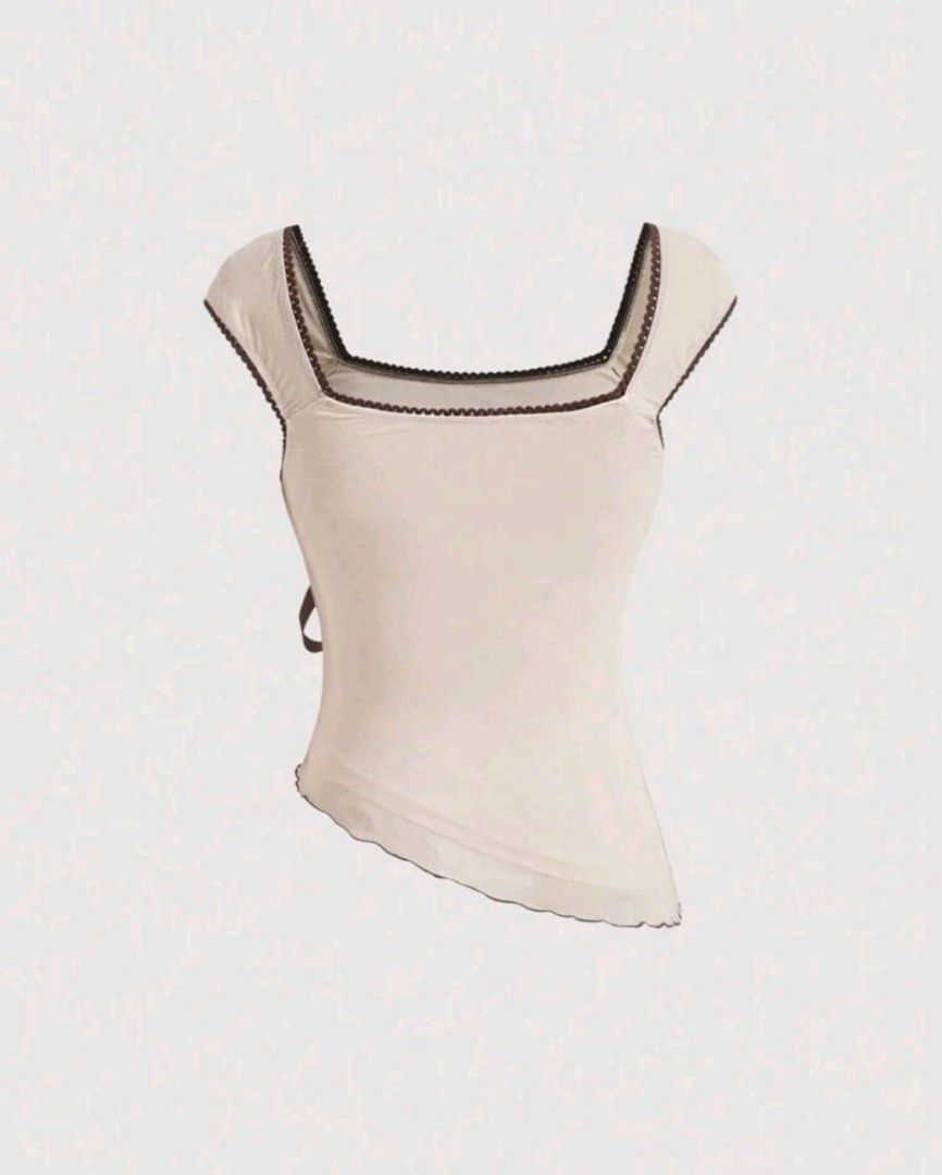 Khaki Assymetrical Hem Bow Tank Top (Category: Sleeveless) located in Pasig City. Submitted by anya2000 (Listing ID 1423736015, Image 2). Description: Khaki Assymetrical Hem Bow Tank Top Earthy Women's Top use once only ( 2hrs).