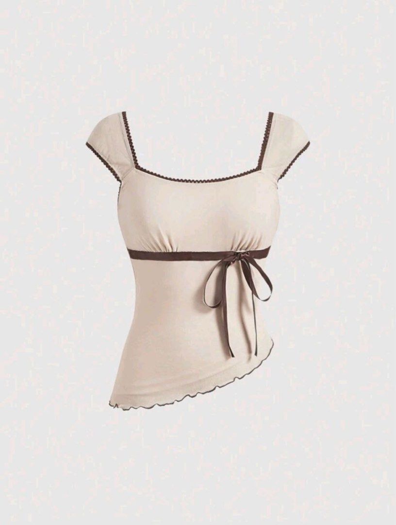 Khaki Assymetrical Hem Bow Tank Top (Category: Sleeveless) located in Pasig City. Submitted by anya2000 (Listing ID 1423736015, Image 1). Description: Khaki Assymetrical Hem Bow Tank Top Earthy Women's Top use once only ( 2hrs).