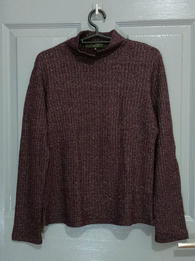La Loreal Burgundy/Dark Purple Long Sleeve Top (Category: Blouses) located in Quezon City. Submitted by trollieshop (Listing ID 1423748459, Image 1). Description: Size: Small to Medium - A long-sleeved top from La Loreal features a ribbed texture and a mock neck. - burgundy / dark purple color with subtle gold threading throughout..