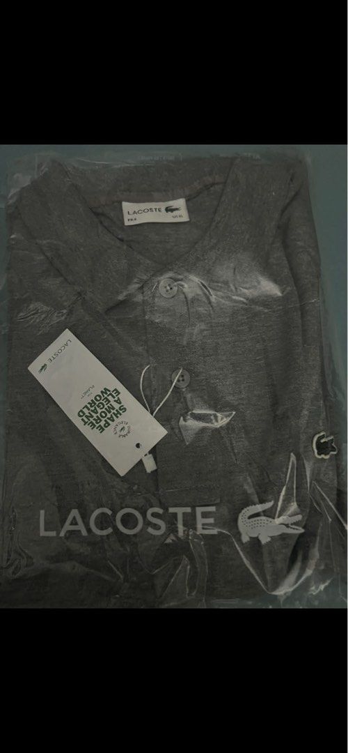 Lacoste Polo Shirt (Category: Tshirts & Polo Shirts ) located in Bacoor. Submitted by roxyraqz (Listing ID 1423756781, Image 2). Description: - Authentic Lacoste polo shirt - Color: - Sizes: US L and XL - Brand new, in original packaging - Features the iconic Lacoste crocodile logo - Perfect for casual wear 💯bought in US 💯Includes original tags - P3,200.