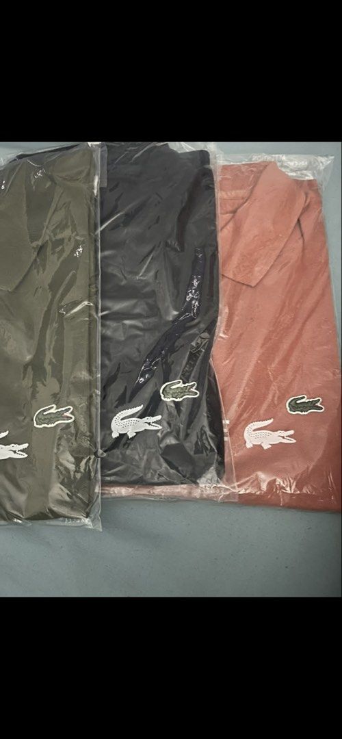 Lacoste Polo Shirt (Category: Tshirts & Polo Shirts ) located in Bacoor. Submitted by roxyraqz (Listing ID 1423756781, Image 1). Description: - Authentic Lacoste polo shirt - Color: - Sizes: US L and XL - Brand new, in original packaging - Features the iconic Lacoste crocodile logo - Perfect for casual wear 💯bought in US 💯Includes original tags - P3,200.