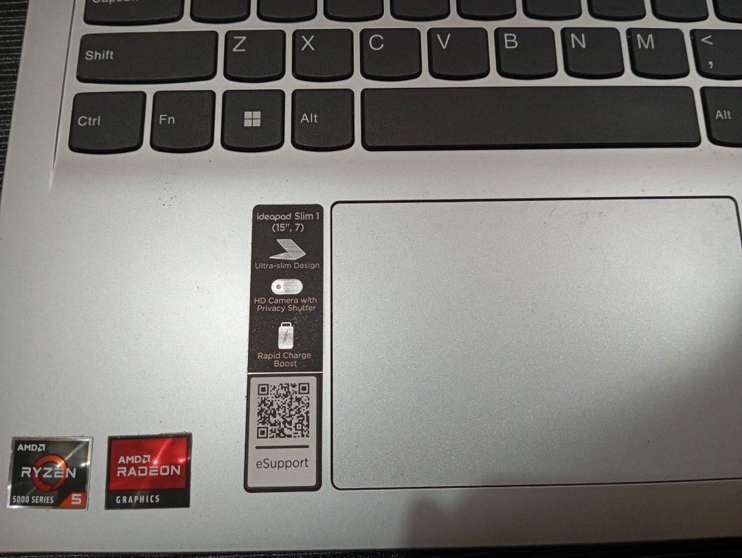 Lenovo IdeaPad Slim 1 (15ALC7) (Category: Laptops & Notebooks) located in Caloocan City. Submitted by arjay_bernarte (Listing ID 1423619395, Image 3). Description: - Lenovo IdeaPad Slim 1 (15ALC7) - AMD Ryzen 5 processor - 8GB RAM - 256GB SSD - Integrated AMD Radeon Graphics - Cloud Grey color - Includes original box - 15-inch screen.