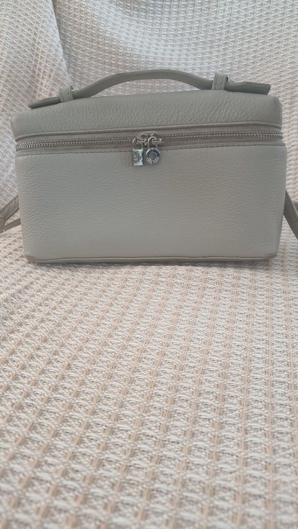 Loro Piana Mini Bag (Category: Luxury Bags & Wallets) located in Gapan. Submitted by prelovedstuff32 (Listing ID 1423640820, Image 1). Description: preloved loro piana bag ..its used condition pero ang ganda padin and elegant check this bag reviews https://youtu.be/CgVWOKkBBrQ?si=QM9PitdVcaLN1-ts.