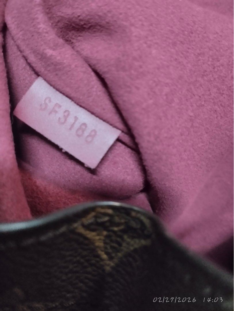 Louis Vuitton Monogram Shoulder Bag (Category: Luxury Bags & Wallets) located in Victorias. Submitted by lan1877 (Listing ID 1423665415, Image 3). Description: - Authentic Louis Vuitton shoulder bag - Iconic Monogram pattern - Drawstring closure - Comfortable shoulder strap - Interior lined with pink fabric - Includes "LOUIS VUITTON PARIS made in France" leather tag - Date code: SF3188.