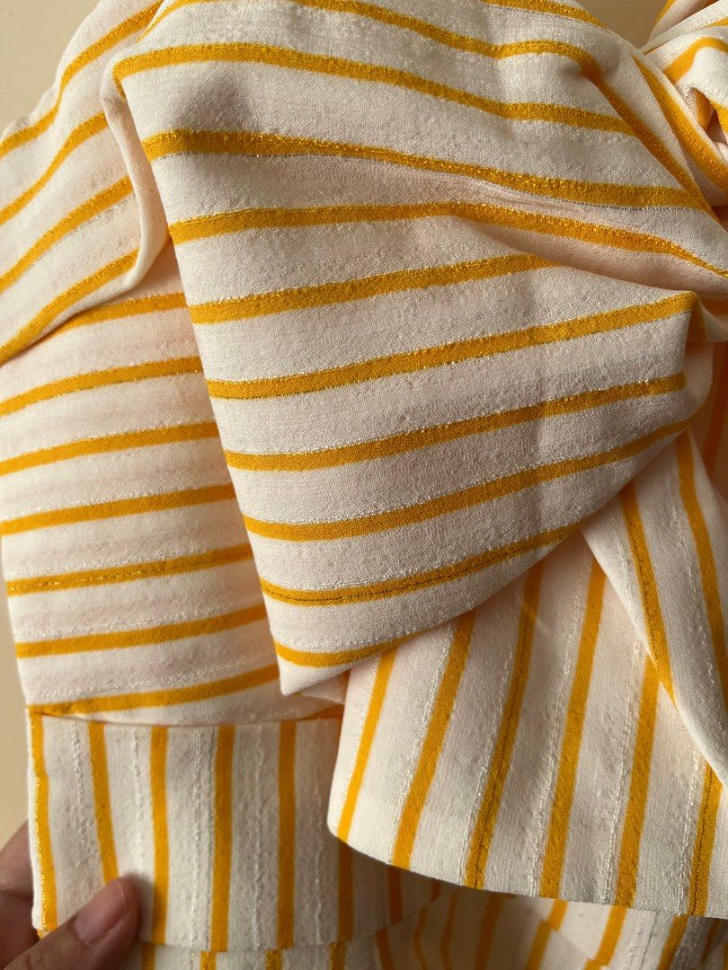 Love, Bonito Striped Jumpsuit (Category: Jumpsuits) located in Pasig City. Submitted by kimcbrl (Listing ID 1423695047, Image 2). Description: - Love, Bonito jumpsuit - Yellow and white striped pattern - Size: XS - Bow detail at bust - Wide straps - Cropped leg length - Lightweight fabric - Perfect for warm weather - Back zipper closure.