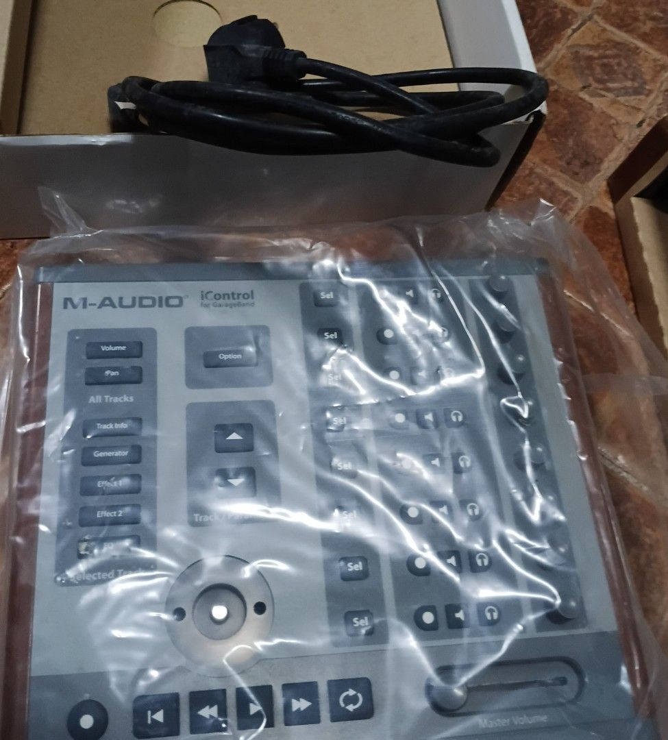 M-Audio iControl Total Control for GarageBand (Category: Other Audio Equipment) located in Quezon City. Submitted by dancatz (Listing ID 1423743324, Image 3). Description: □ P 2000.00 □ as/is. never tested - M-Audio iControl MIDI controller - Designed for GarageBand - Controls for track selection, parameters, and master volume - Play, rewind, fast forward, and loop buttons - Comes with original box.
