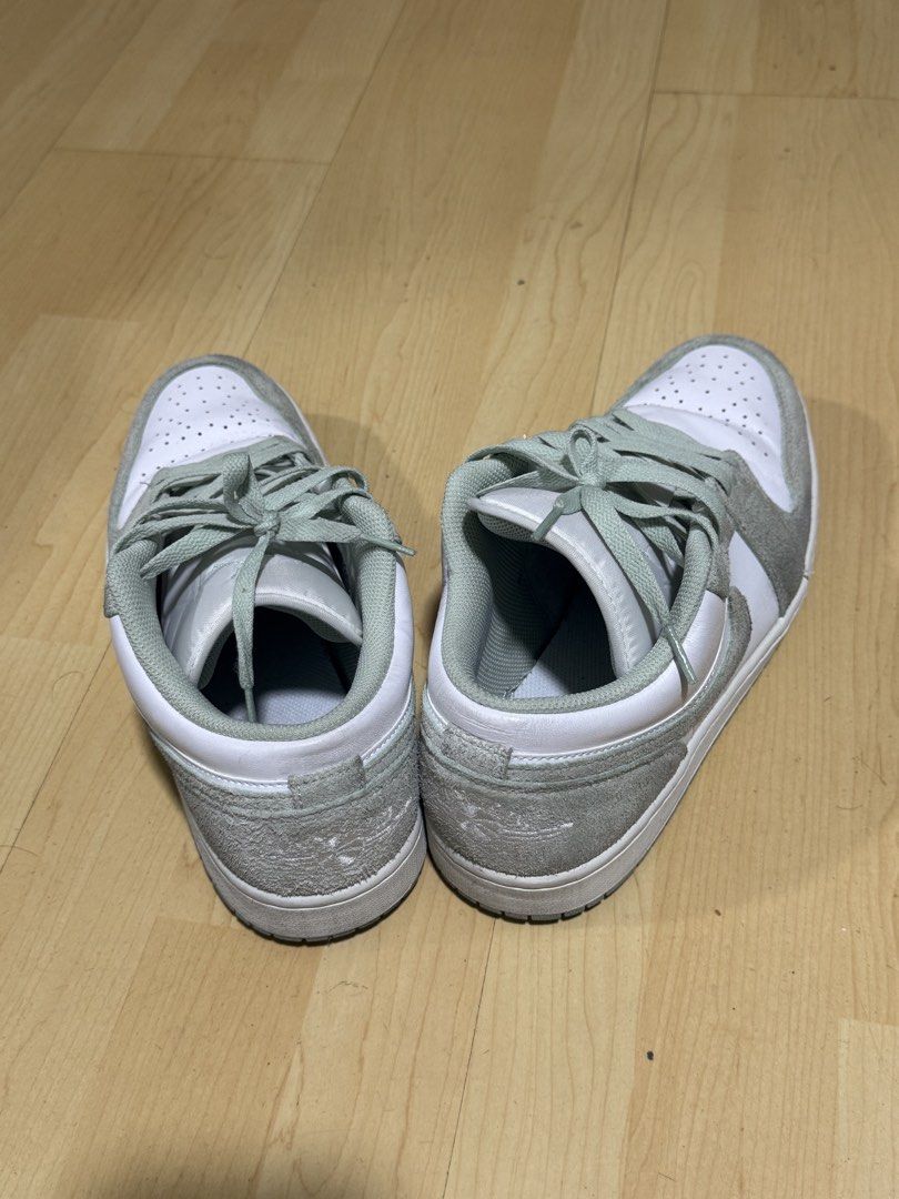 Nike Air Jordan 1 Low (Category: Sneakers) located in Mandaluyong City. Submitted by mr022 (Listing ID 1423665225, Image 1). Description: - Nike Air Jordan 1 Low sneakers - White and green color scheme - Low-top design - Features suede-like material on overlays - White midsole - Iconic Nike swoosh on sides - Matching green laces - slight dirt on suedes but can still be cleaned by deep cleaning For meet-up only RFS: need funds for medical bills.