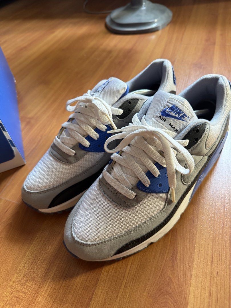Nike Air Max 90 OG Royal (Category: Sneakers) located in Mandaluyong City. Submitted by voltprime (Listing ID 1423678385, Image 1). Description: - Nike Air Max 90 - Colorway: White, Royal Blue - Men's US Size 10.5 / UK 9.5 / EUR 44.5 / Women's US 12 - Iconic Air Max design with visible air unit - Includes original box - Soles show wear and tear - Midsole Cracking - good contion ginami lang sa mall nag crack lang midsole paint dahil naka display l