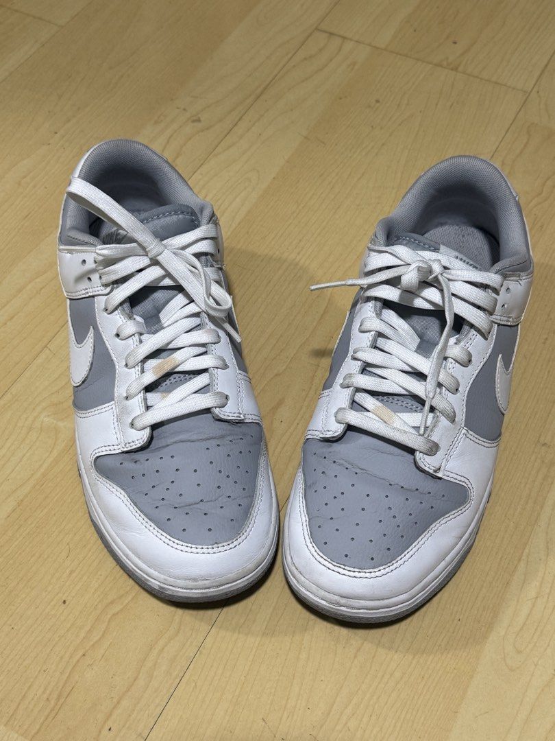Nike Dunk Low Grey White (Category: Sneakers) located in Mandaluyong City. Submitted by mr022 (Listing ID 1423667081, Image 3). Description: - Nike Dunk Low - Color: Grey and White - Nike logo on side and heel - White laces - Grey sole and insoles -With few dirts and stain on laces. But still can be cleaned and removed For meet-up only RFS: need funds for medical bills.
