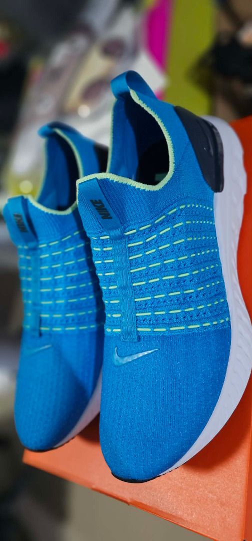 Nike React Phantom Run Flyknit 2 (Category: Sneakers) located in Cavite. Submitted by live_once (Listing ID 1423648514, Image 1). Description: - Nike React Phantom Run Flyknit 2 - Color: Blue - Flyknit upper - Slip-on design - White React foam sole - Nike logo on side and insole - Includes original box Brand new Nike react phantom run fk 2 (size 12 US) Priced at 7k pesos selling low for only 2700 pesos RFS: wrong size.