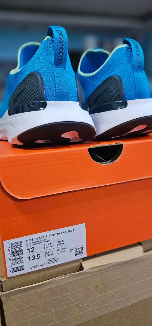 Nike React Phantom Run Flyknit 2 (Category: Sneakers) located in Cavite. Submitted by live_once (Listing ID 1423648514, Image 2). Description: - Nike React Phantom Run Flyknit 2 - Color: Blue - Flyknit upper - Slip-on design - White React foam sole - Nike logo on side and insole - Includes original box Brand new Nike react phantom run fk 2 (size 12 US) Priced at 7k pesos selling low for only 2700 pesos RFS: wrong size.