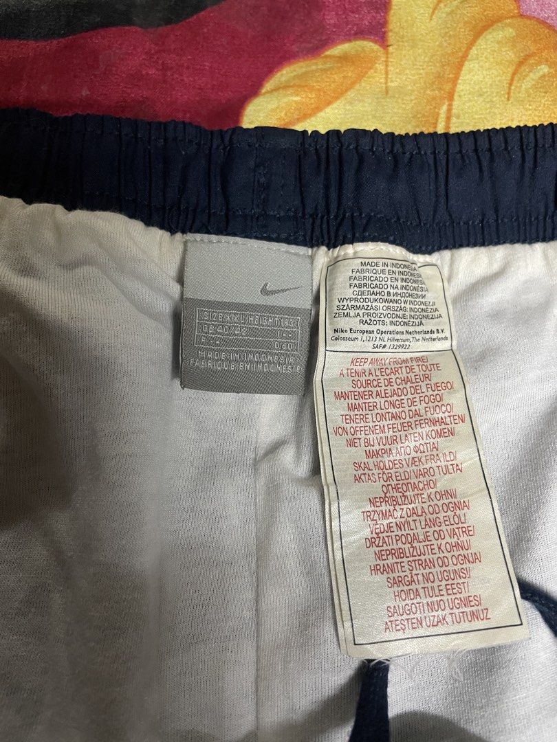 Nike Track Pants - Navy Blue (Category: Joggers) located in Quezon City. Submitted by thrifttogreatness (Listing ID 1423640439, Image 2). Description: - Navy blue Nike track pants - Elastic waistband with drawstring - Nike logo on front - Relaxed fit - Ideal for casual wear and workouts.