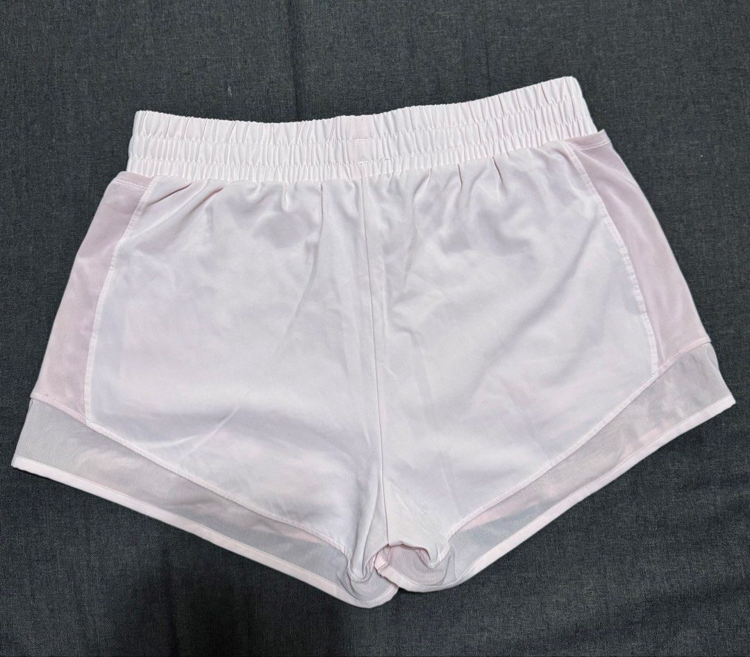 Pink Athletic Shorts (Category: Shorts) located in Manila. Submitted by gcel01 (Listing ID 1423745740, Image 2). Description: - Light pink athletic shorts - Mesh detailing on sides - Rfs: Decluttering .