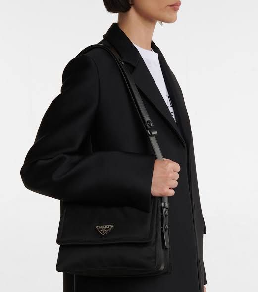 Prada - Re-Nylon Small Traveler Padded Shoulder Bag (Category: Luxury Bags & Wallets) located in Paranaque City. Submitted by millennial_goodz (Listing ID 1423722017, Image 2). Description: WTS Prada - Re-Nylon Small Traveler Padded Shoulder Bag Rank A - No Flaws Bag itself only (Missing dustbag and paperbag) P12,500 only DM.