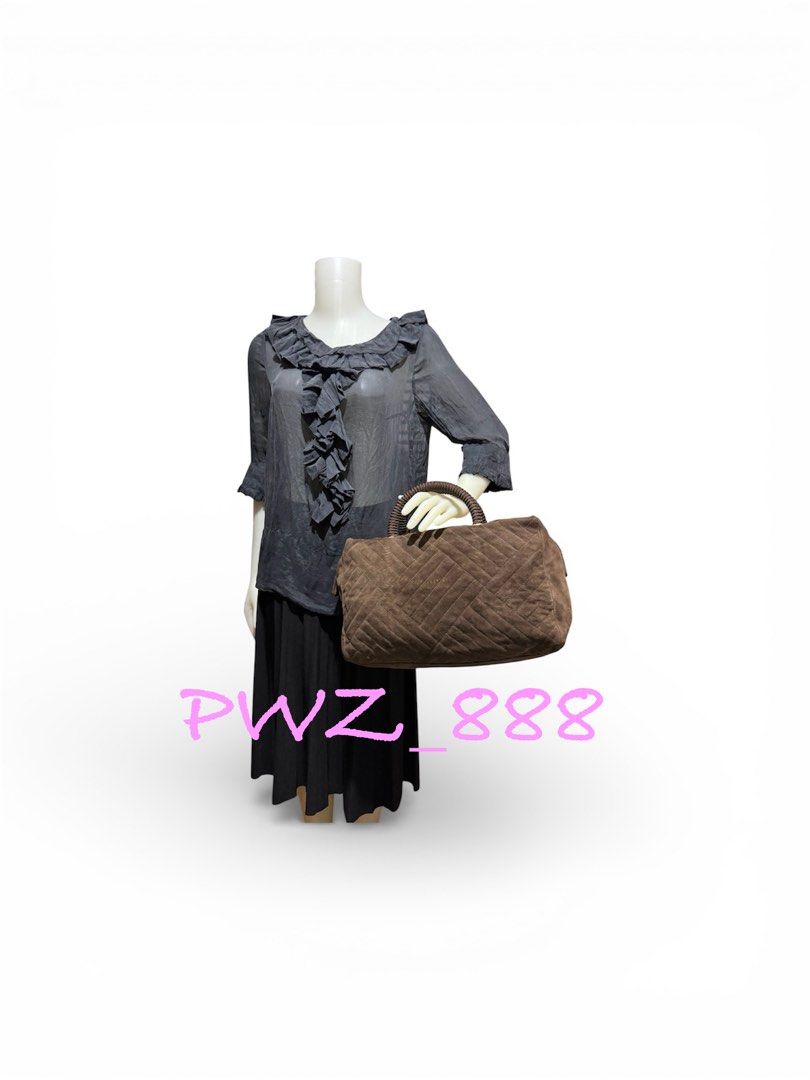 Prada Suede Boston Bag (Category: Luxury Bags & Wallets) located in Baguio. Submitted by pwz-eshop (Listing ID 1423615697, Image 3). Description: • Please take time to read. • I do not reserve items. I only mark items as reserved when it is paid. Paid items are shipped the next day. No shipping on holidays. • I do not have when worn pictures, please rely on actual dimensions for sizing. • Up for Grabs!! • Guaranteed Authentic!! • Flaws: Bended ha