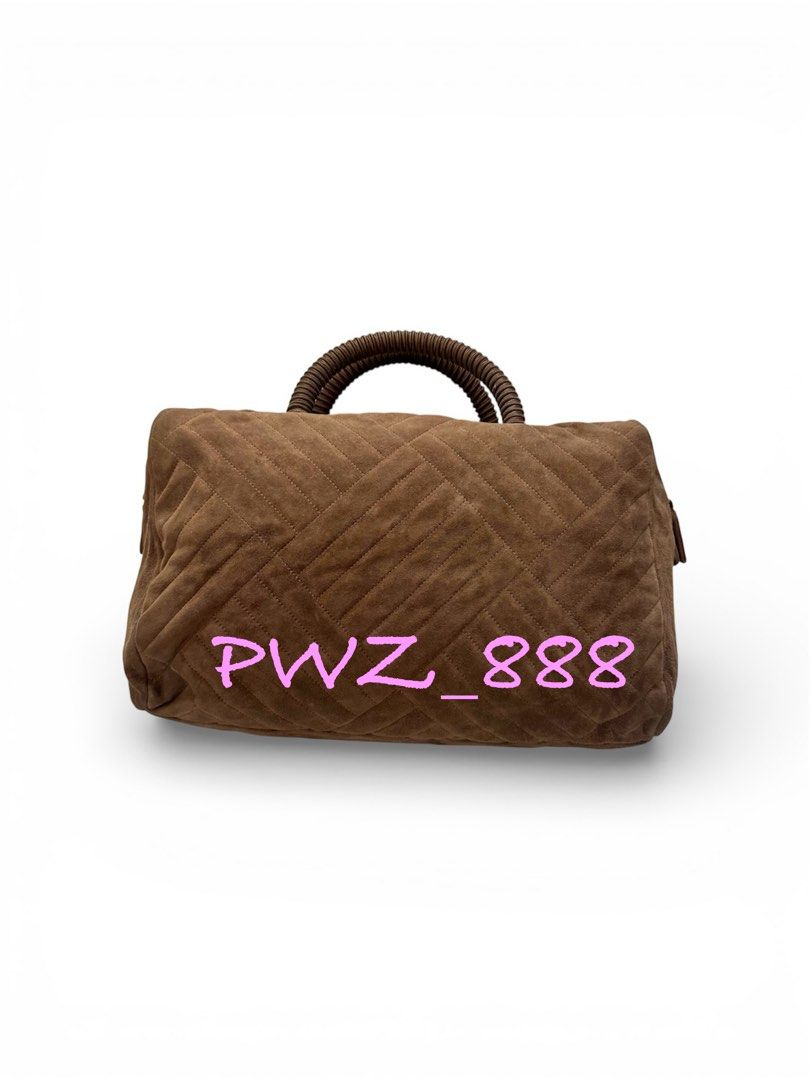 Prada Suede Boston Bag (Category: Luxury Bags & Wallets) located in Baguio. Submitted by pwz-eshop (Listing ID 1423615697, Image 1). Description: • Please take time to read. • I do not reserve items. I only mark items as reserved when it is paid. Paid items are shipped the next day. No shipping on holidays. • I do not have when worn pictures, please rely on actual dimensions for sizing. • Up for Grabs!! • Guaranteed Authentic!! • Flaws: Bended ha