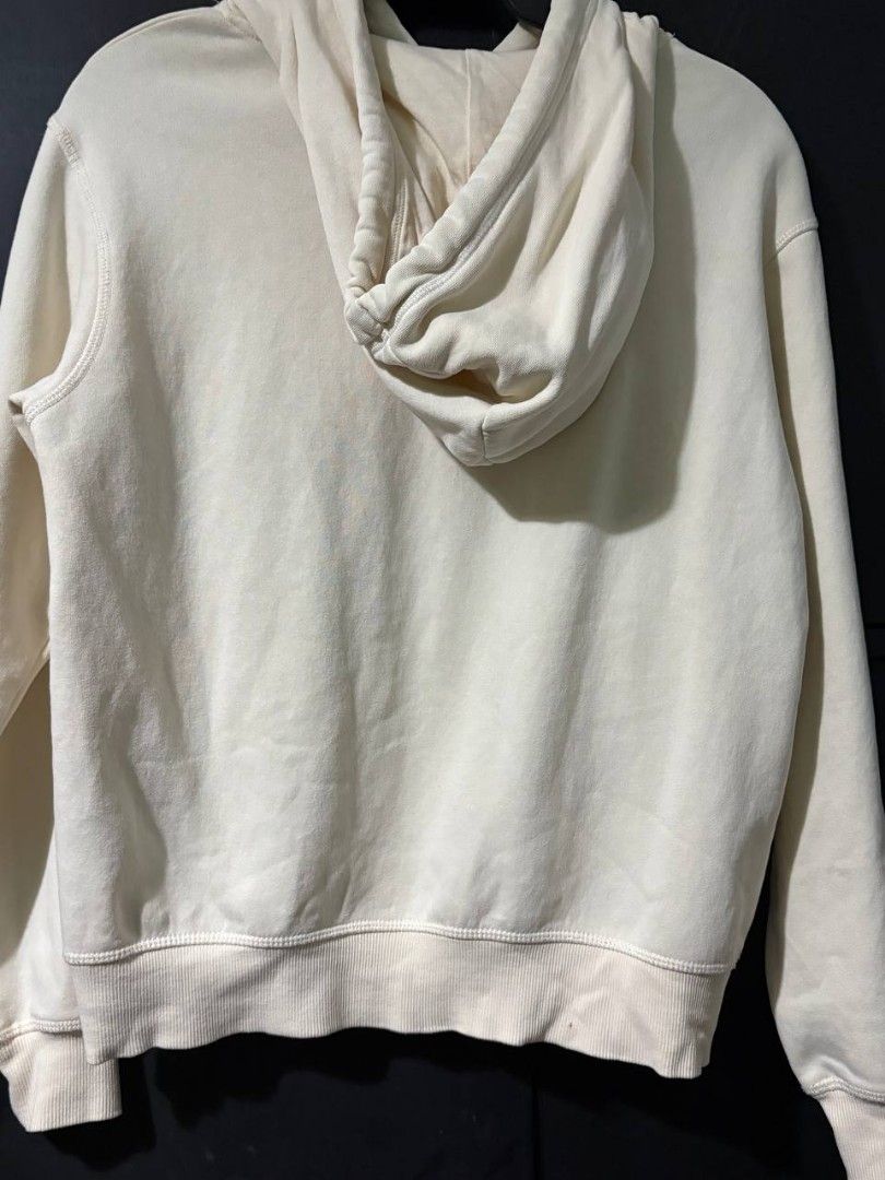 Pre-loved H&M Mickey Mouse Hoodie (Category: Hoodies) located in Manila. Submitted by Rhidell (Listing ID 1423621829, Image 2). Description: - Cream-colored H&M hoodie - Features a Mickey Mouse graphic - Size: S - Drawstring hood and long sleeves -small stain at the back hardly noticeable.