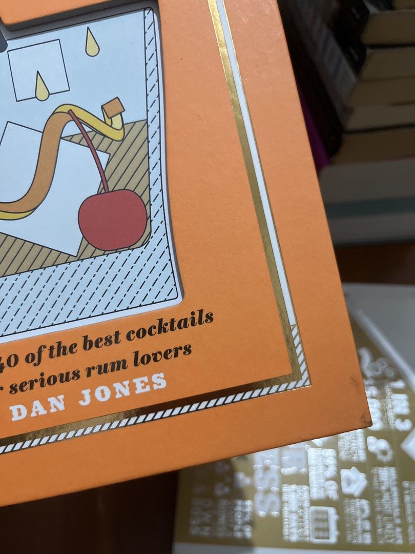 Rum Cocktails by Dan Jones (Category: Storybooks) located in Manila. Submitted by alexandriadlp (Listing ID 1423715288, Image 2). Description: Book by Dan Jones features over 40 of the best rum-based cocktails. It includes recipes for daiquiris, punches, and reinventions. Learn how to select homemade syrups and infusions. Perfect for those who enjoy rum and want to expand their cocktail repertoire. Ideal for home drink cabinets and cocktail parti