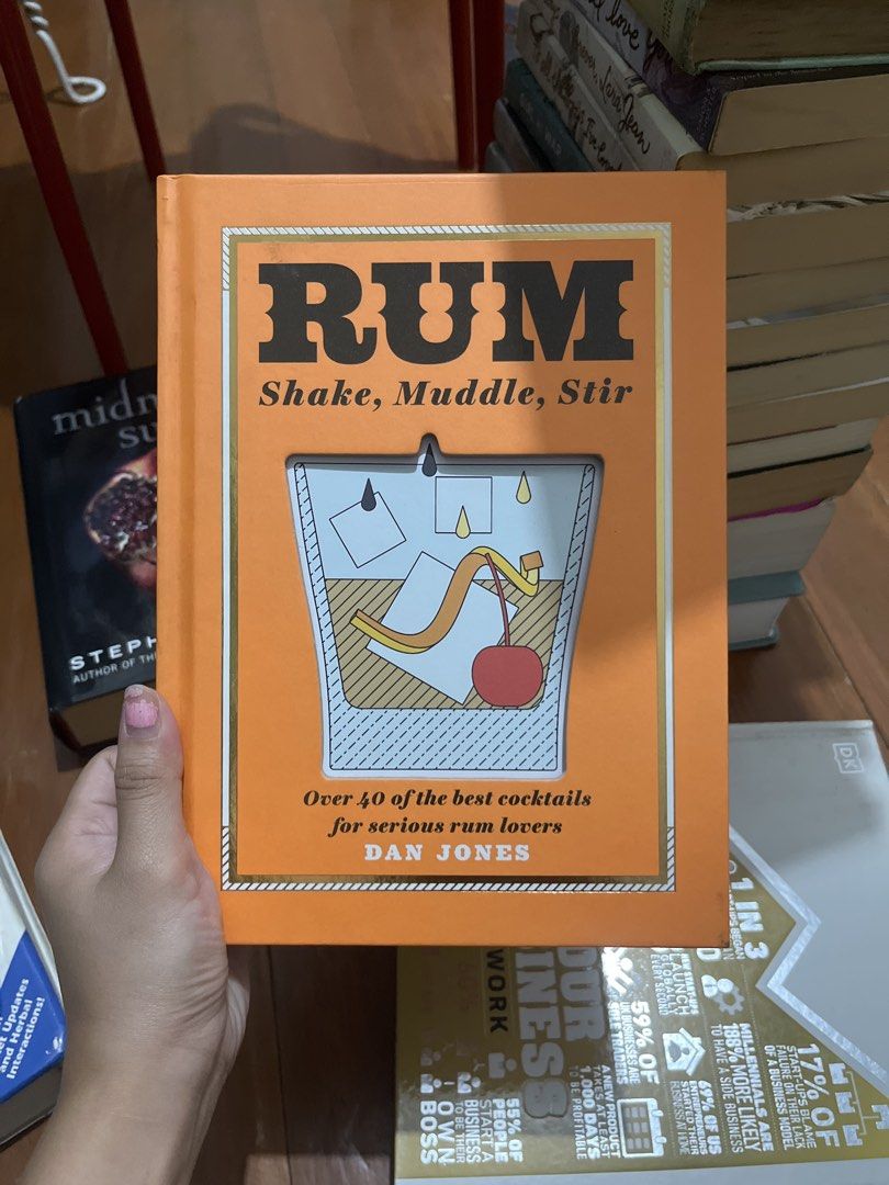 Rum Cocktails by Dan Jones (Category: Storybooks) located in Manila. Submitted by alexandriadlp (Listing ID 1423715288, Image 1). Description: Book by Dan Jones features over 40 of the best rum-based cocktails. It includes recipes for daiquiris, punches, and reinventions. Learn how to select homemade syrups and infusions. Perfect for those who enjoy rum and want to expand their cocktail repertoire. Ideal for home drink cabinets and cocktail parti