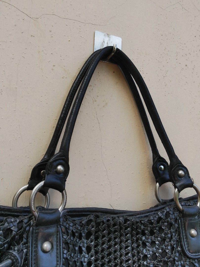 Sabrina Scala Black Woven Handbag (Category: Shoulder Bags) located in Quezon. Submitted by thrift.21 (Listing ID 1423680872, Image 3). Description: - Sabrina Scala black woven handbag - Double handles - Zippered closure - Interior zippered pocket - Patterned lining - Silver-tone hardware - Woven exterior design - Leather handles.