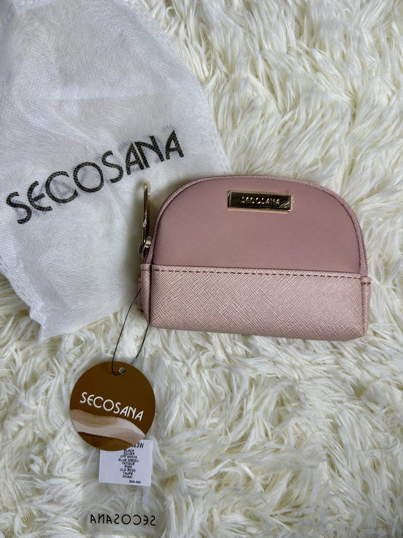 Secosana Coin Purse (Category: Purses & Pouches) located in Manila. Submitted by riided (Listing ID 1423742526, Image 1). Description: Original Price: ₱1300 Unused / brand new condition w/ hang tag Comes with dust pouch - Secosana coin purse - Lovely pink color - Secure zip closure - Features a small gold-tone logo - Includes dust bag - Comes with original tag - Tag indicates Taupe color - Perfect for coins and small essentials.