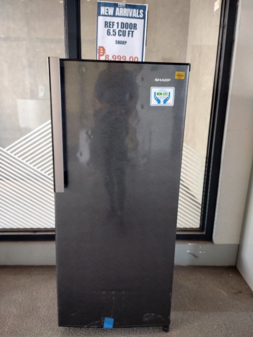 Sharp 1-Door Refrigerator 6.5 cu ft (Category: Refrigerators and Freezers) located in Caloocan City. Submitted by dhiony (Listing ID 1423620646, Image 1). Description: - Brand new Sharp 1-door refrigerator - 6.5 cu ft capacity - Sleek dark exterior - Non-CFC (as indicated by sticker) .