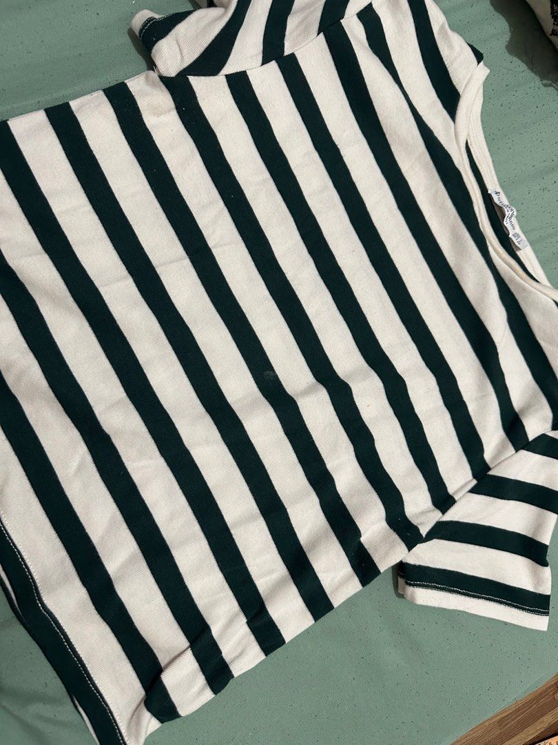 Stradivarius Striped T-shirt - Size L (Category: Shirts) located in Manila. Submitted by jmalinea (Listing ID 1423664489, Image 3). Description: - Stradivarius striped t-shirt - Color: Green and white - Size: L - Features: Round neck, short sleeves - Made in Turkey - Classic striped pattern - Perfect for everyday wear.