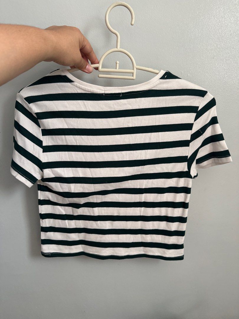 Stradivarius Striped T-shirt - Size L (Category: Shirts) located in Manila. Submitted by jmalinea (Listing ID 1423664489, Image 2). Description: - Stradivarius striped t-shirt - Color: Green and white - Size: L - Features: Round neck, short sleeves - Made in Turkey - Classic striped pattern - Perfect for everyday wear.