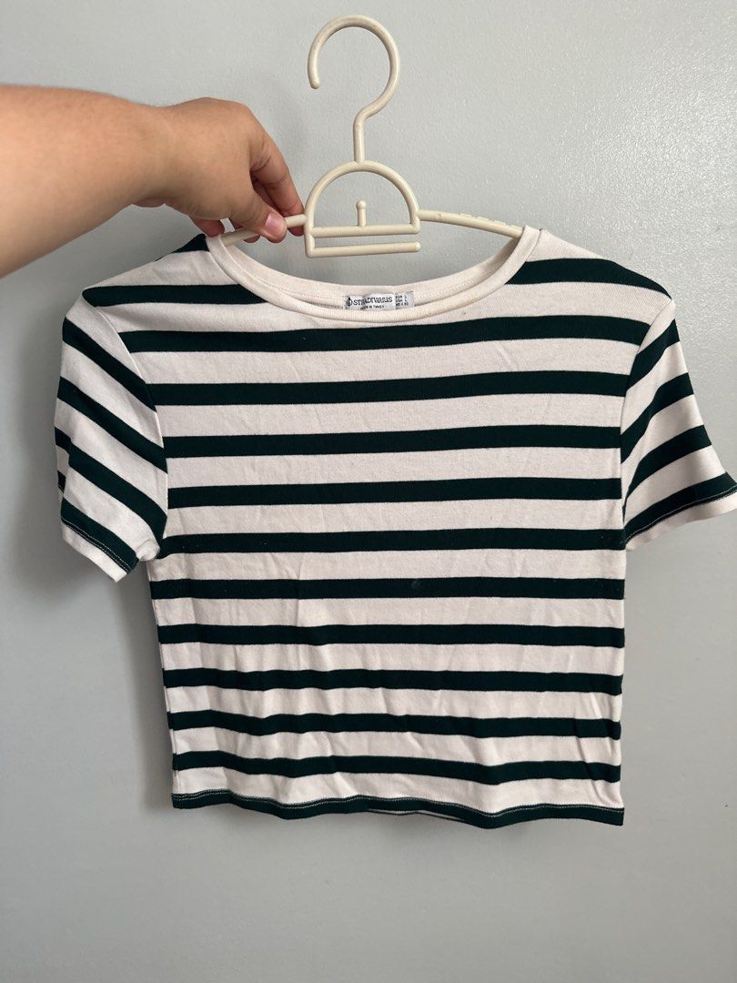 Stradivarius Striped T-shirt - Size L (Category: Shirts) located in Manila. Submitted by jmalinea (Listing ID 1423664489, Image 1). Description: - Stradivarius striped t-shirt - Color: Green and white - Size: L - Features: Round neck, short sleeves - Made in Turkey - Classic striped pattern - Perfect for everyday wear.