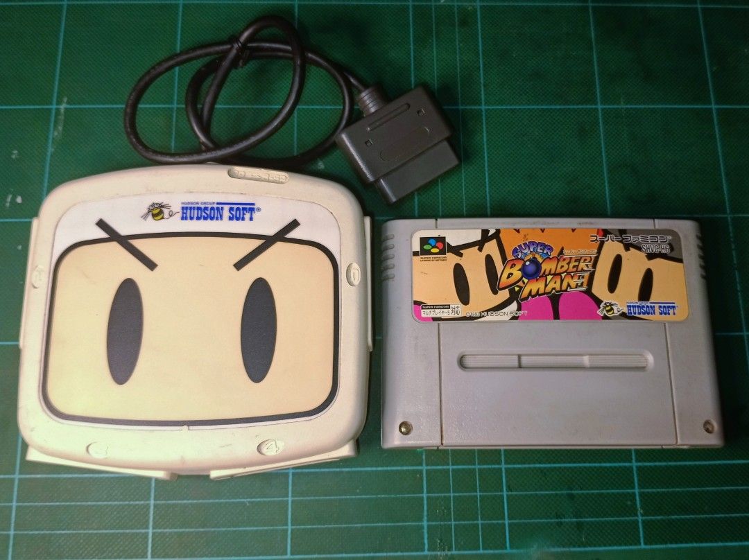 Super Nintendo Super Multitap 2 + Super Bomberman Cartridge (Category: Nintendo) located in Caloocan City. Submitted by toywarsph (Listing ID 1423746894, Image 1). Description: - Super Multitap 2 by Hudson Soft included - Super Bomberman cartridge for SNES included - Allows for multiple controllers (Multitap) - Fully functional - Perfect for multiplayer gaming -tested working payment via gcash ship via Lalamove or Flash .