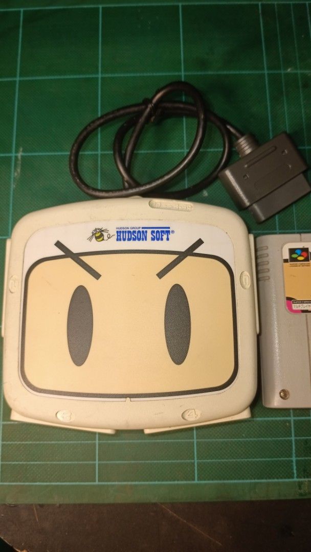 Super Nintendo Super Multitap 2 + Super Bomberman Cartridge (Category: Nintendo) located in Caloocan City. Submitted by toywarsph (Listing ID 1423746894, Image 2). Description: - Super Multitap 2 by Hudson Soft included - Super Bomberman cartridge for SNES included - Allows for multiple controllers (Multitap) - Fully functional - Perfect for multiplayer gaming -tested working payment via gcash ship via Lalamove or Flash .