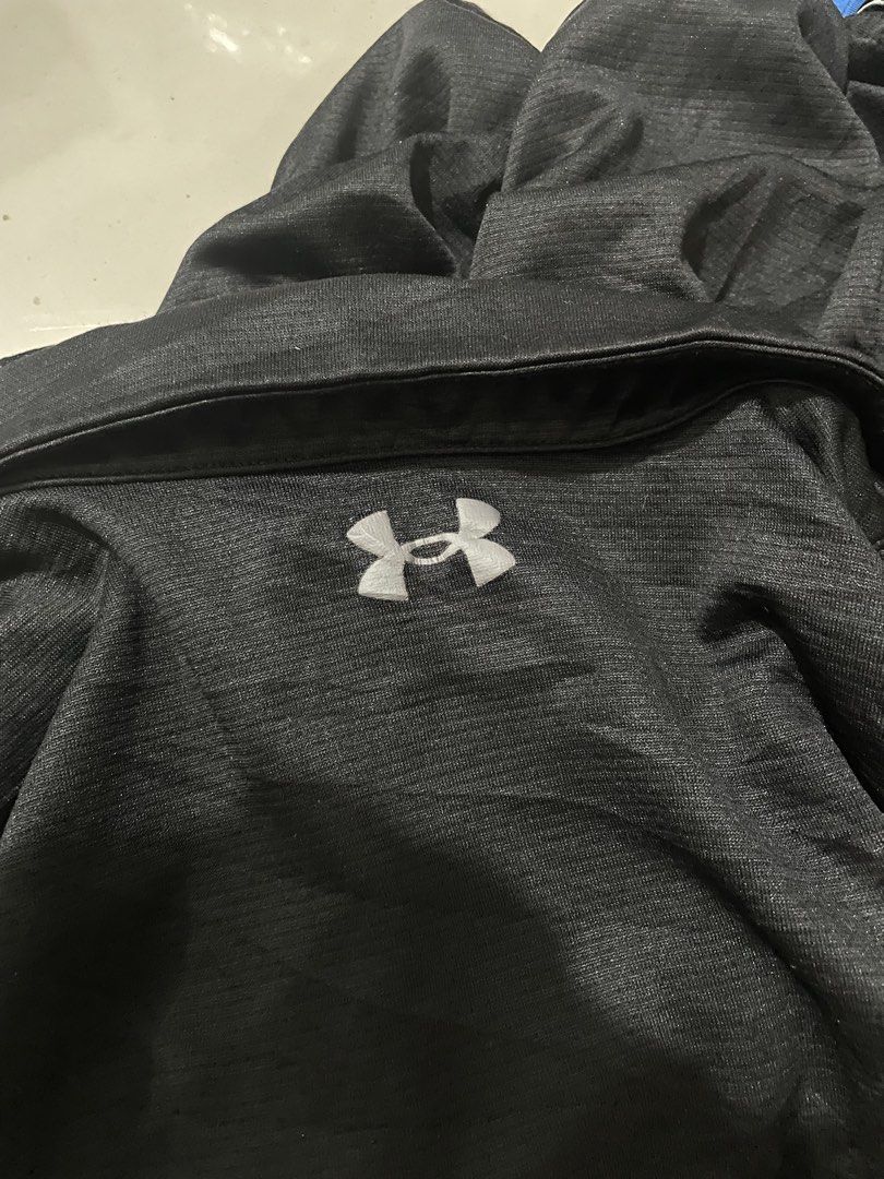 Under Armour Black Polo Shirt (Category: Tshirts & Polo Shirts ) located in Cavite. Submitted by rncthrifting (Listing ID 1423728364, Image 2). Description: 25 width 28 length - Black Under Armour polo shirt - Short-sleeved - Collared neckline - Quarter-zip closure - Under Armour logo on chest - Textured, breathable fabric - Ideal for athletic activities or casual wear.